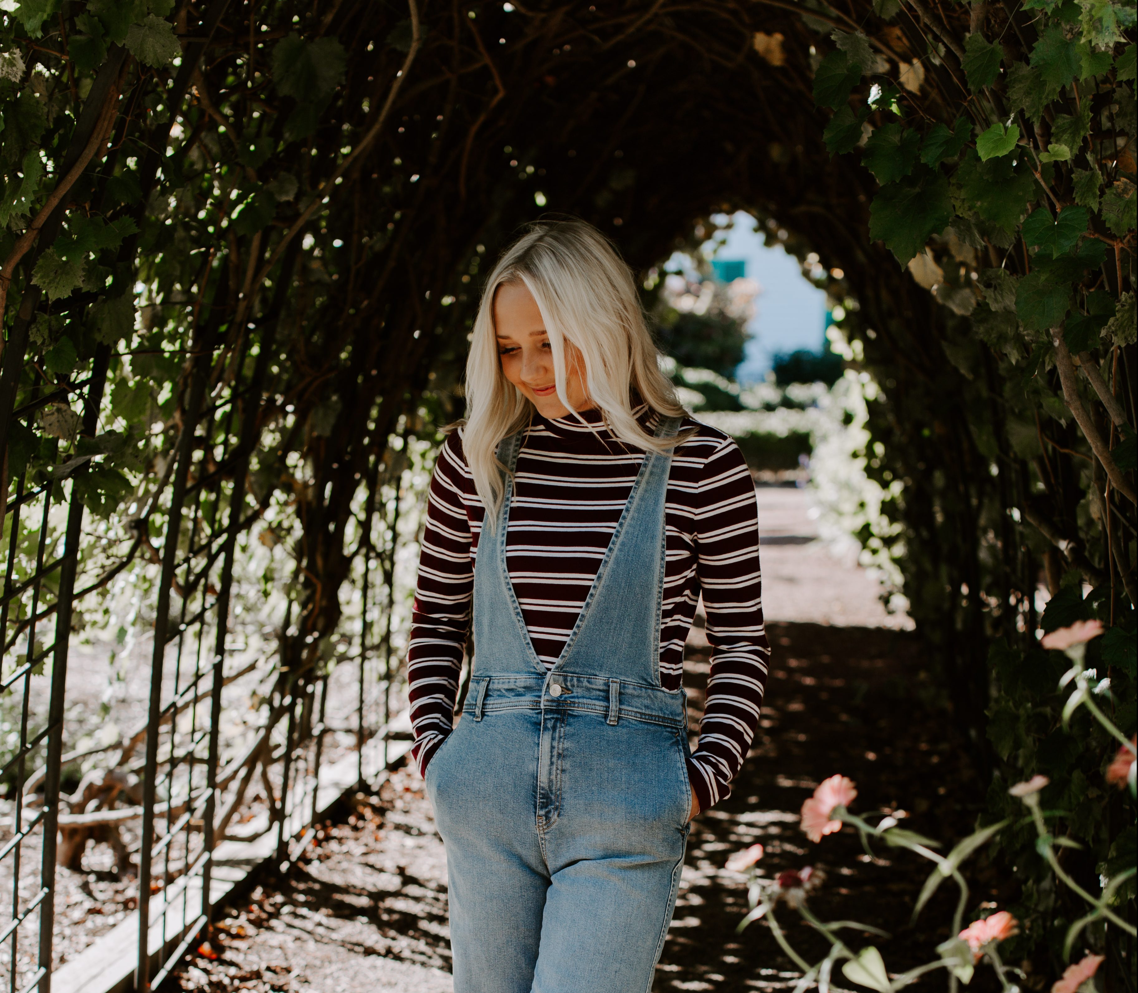 Ashley W. free people senior pictures leaf tunnel striped shirt boots candid model pose wedding elopement blonde hair outfit overalls